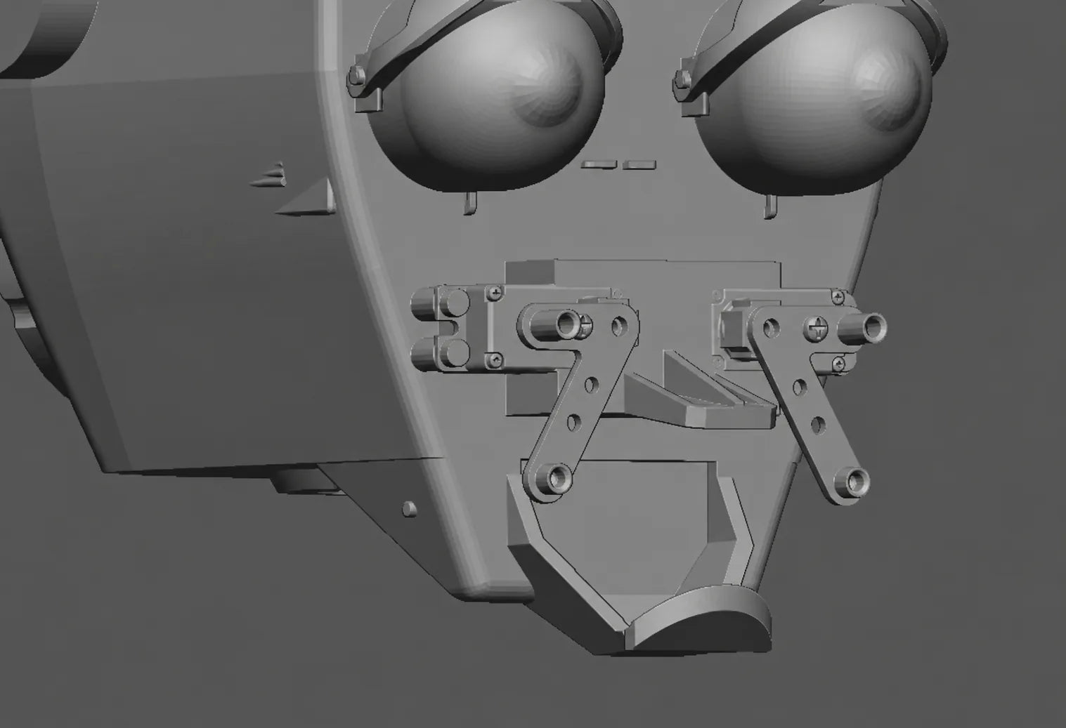 Close view of the expression linkage behind a custom silicone face